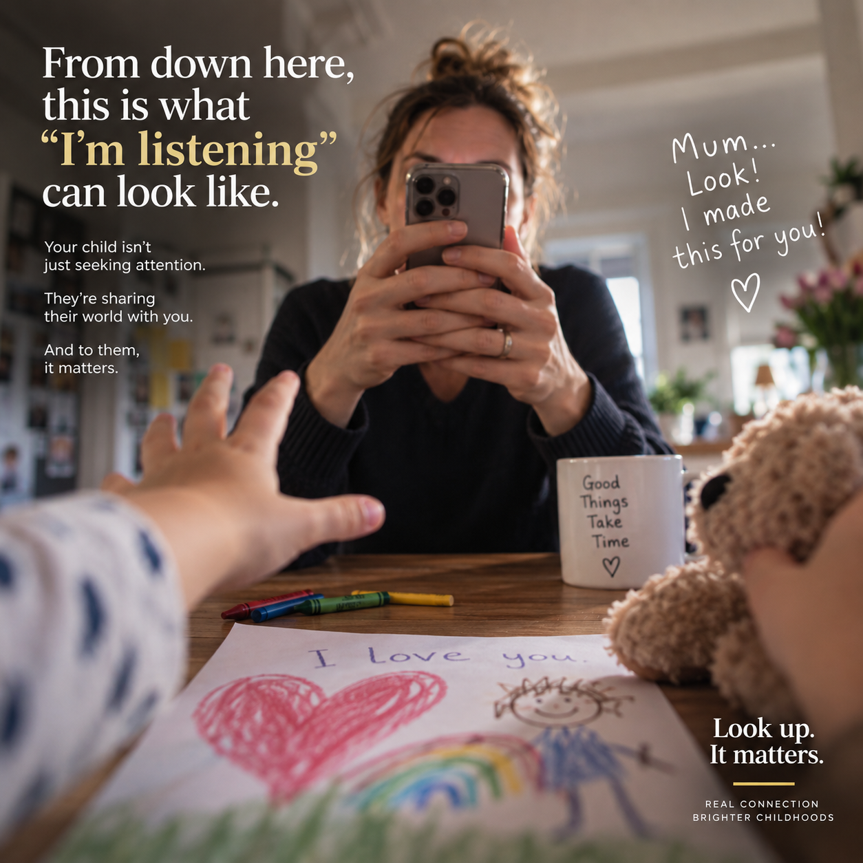 Child's-eye view of a parent using a phone at the table